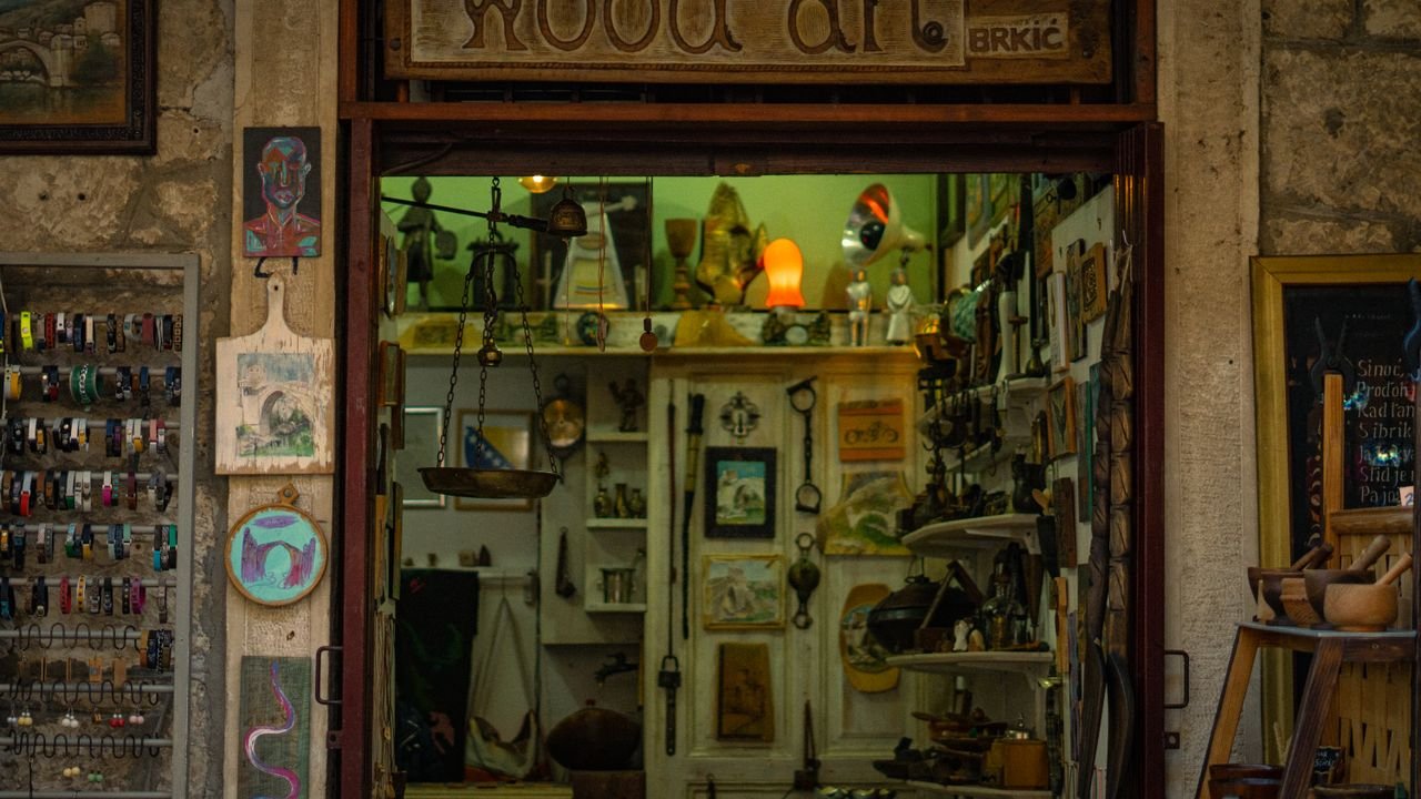 Explore a unique artisan shop with wood art and handmade crafts in a vibrant urban setting.