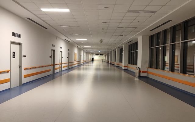 Wide corridor view in a modern hospital, Ankara, Türkiye. Well-lit and clean interior.